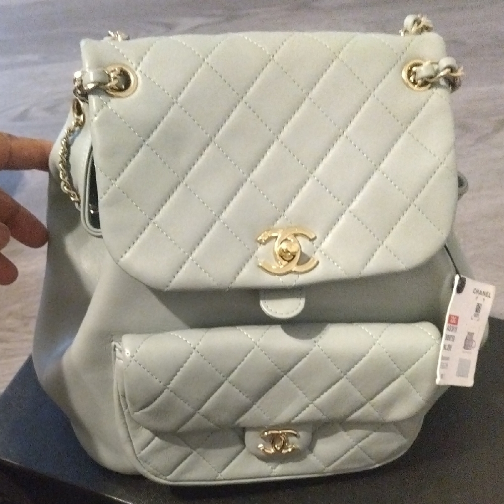 Chanel Quilted Cream Backpack with Gold Accents